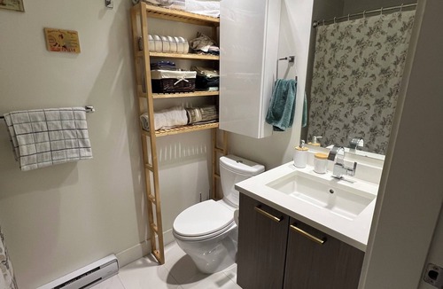 Kensington-Cedar Cottage Condo | Cozy private room and bathroom