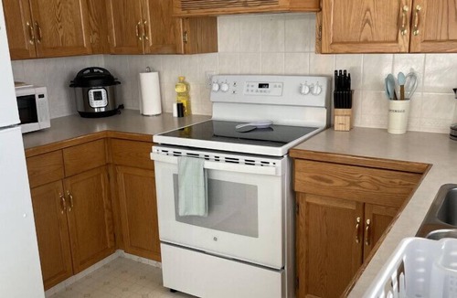 Camrose House | Cozy three bedroom home Cozy three bedroom home