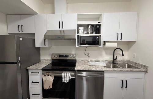 Saskatoon Apartment | Crisp & Connected: Newly Finished 2BR Family Home