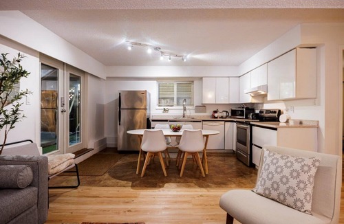 Deep Cove House | Deep Cove Family Retreat | Huge Private Patio & Yard