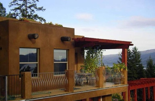 Central Okanagan House | Down to earth holiday in a unique home, high above Okanagan Lake.