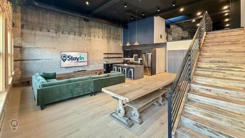 Historic Downtown Fernie Apartment | Downtown Loft with Rooftop Hot Tub by StayIn