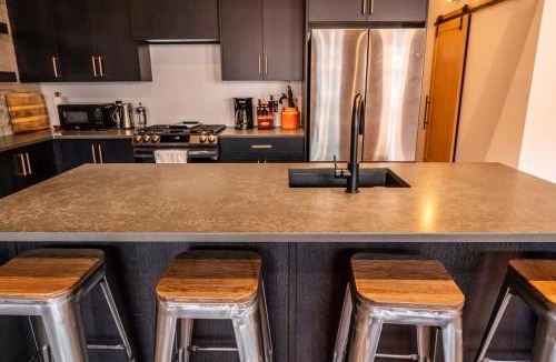 Historic Downtown Fernie Apartment | Downtown Loft with Rooftop Hot Tub by StayIn