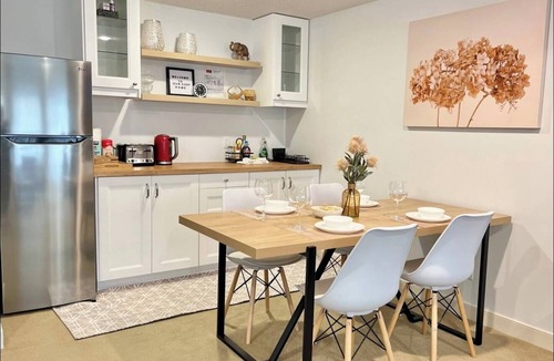 Cranston Apartment | Elegant 2 Bdr suite with cozy Fireplace & Privacy.