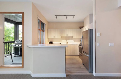 Village North Hotel | Enjoy Luxury Living & Ideal Village Location | Pool & Hot Tub