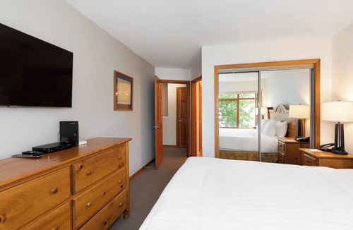 Village North Hotel | Enjoy Luxury Living & Ideal Village Location | Pool & Hot Tub