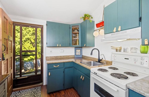 Miller Lake House | Escape to Stone & Timber: A private forest retreat on nearly 4 acres between Tobermory and Lion's Head. Enjoy vaulted ceilings, a cozy wood stove, private walking trails, and easy access to hiking, beaches, boat launches, and Dark Sky stargazing.