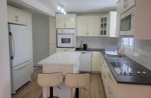 Pointe-aux-Trembles House | Experience comfort, style, and tranquility in this beautifully renovated home.