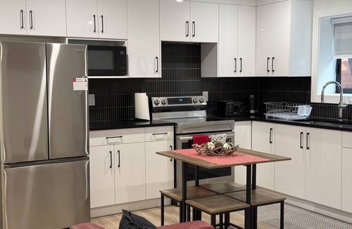 Guildford House | Family-sized 2 bedroom suite. Close to the highway, mall, & more