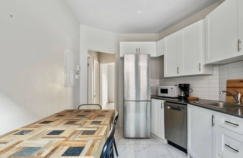 Cote-Des-Neiges—Notre-Dame-De-Grace Apartment | Freshly Designed Urban Space