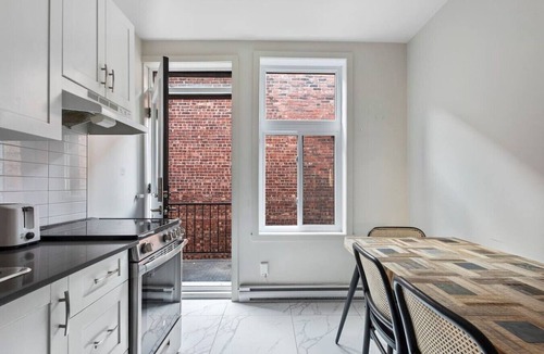 Cote-Des-Neiges—Notre-Dame-De-Grace Apartment | Freshly Designed Urban Space