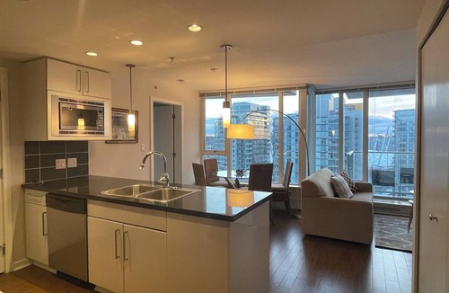 Central Condo | Great View | Two Bedrooms | Next to BC Place | Air Conditioners | Parking
