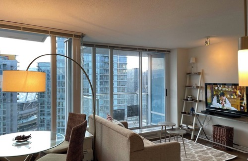 Central Condo | Great View | Two Bedrooms | Next to BC Place | Air Conditioners | Parking