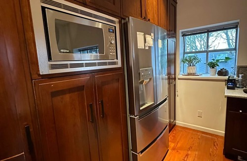 Kitsilano House | Heritage Townhome Steps from the Beach in Kitsilano with Private Rooftop Patio