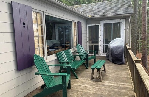 Melvin Village Cabin | Hidden Gem on Melvin Bay | Cozy Cabin Beneath the Trees