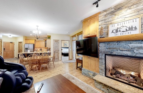 Big White Ski Resort Condo | Homey ski-in/out condo with private hot tub & entertainment