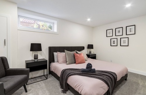 Chestermere Apartment | "Inky & Rose" Stylish Two Bedroom Lower Suite