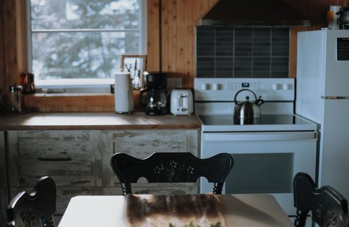 Saint-Marcellin Ski Chalet | Intimate, enchanting lakeside haven with spa. Pets allowed