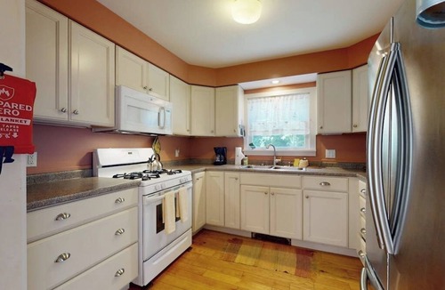 Bath House | Kennebec View- Charming Cape-style House with Panoramic River Views and Modern Amenities