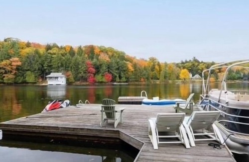 Muskoka Lakes Cottage | Lake Rosseau, Muskoka Waterfront 6bedroom. Large wrap around deck.