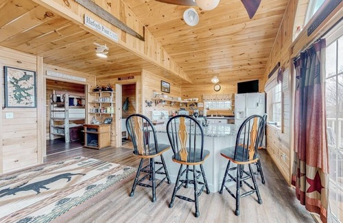 Greenville Junction House | Lake-view two-story home with beach access, wood stove, grill, W/D, & fast WiFi