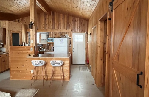Traverse Bay Cottage | LAKEFORNT-NEW LISTING BY NIRVANA RENTAL AND PROPRTY MANAGEMENT Rent 2 get 2 free
