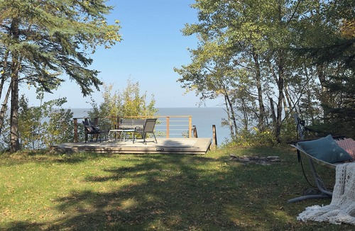 Traverse Bay Cottage | LAKEFORNT-NEW LISTING BY NIRVANA RENTAL AND PROPRTY MANAGEMENT Rent 2 get 2 free