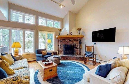 Bridgton Condo | Lakefront condo with on-site pool, dock, swimming, firepit, & tennis