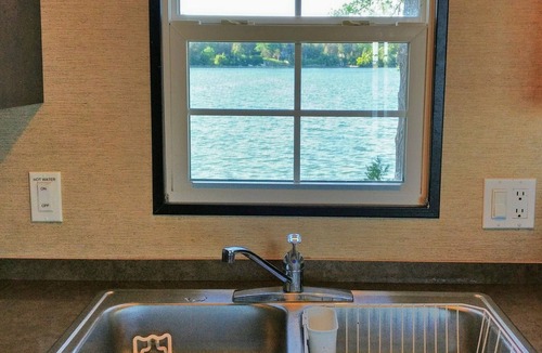 Cherry Valley Cottage | Lakefront Cottage Near Sandbanks with Sunset View and Picton