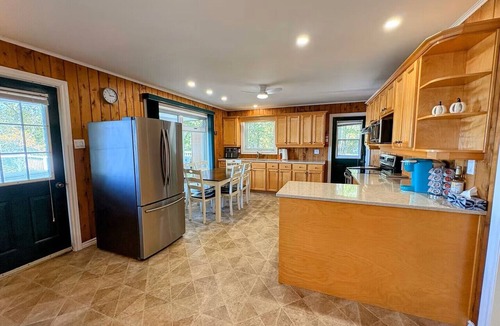 Springfield Cottage | Lakefront Escape with hot tub and outdoor kitchen