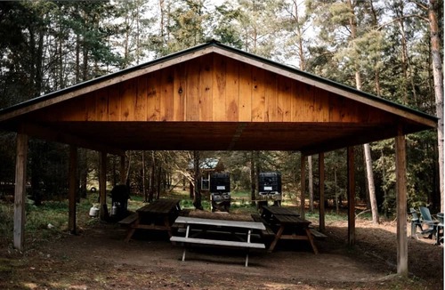 Roseneath Cabin | Lakeside Group Cabin with Huge Deck, Fire Pits & Sunset Views in Ontario, Canada