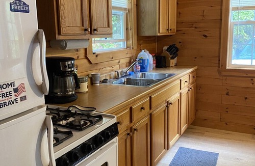 Skowhegan Cabin | Loon Lodge.A charming 2-bedroom cabin in the woods of Skowhegan with AC, WiFi