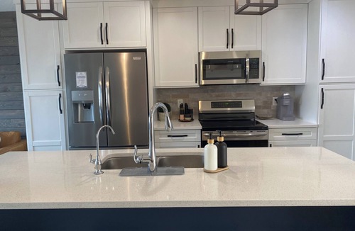 Sylvan Lake House | Luxury Lakeview Townhome in Sylvan Lake with a private backyard oasis.