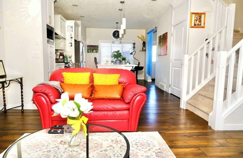 Southeast Calgary House | Mahogany Loft Retreat | King Bed, A/C, Gazebo, Fireplace, BBQ, 100" Home Cinema