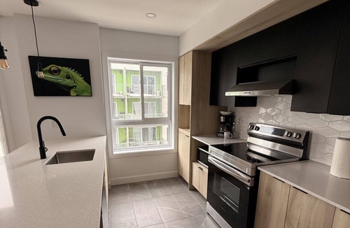 Plateau Apartment | Modern 1BD Suite at Le Prisme w/Private Balcony, Pool, Gym & Yoga Studio