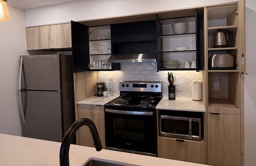 Plateau Apartment | Modern 2BD/2BA Suite at Le Prisme w/Indoor Pool, Gym & Yoga Studio