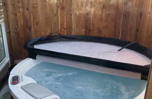Conception Bay South Apartment | Modern 3 bed basement apt with hot tub