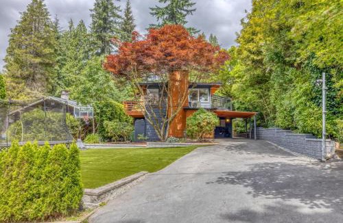 Upper Lonsdale House | Modern Mid-Century Home with Solarium, Deck, and Jacuzzi