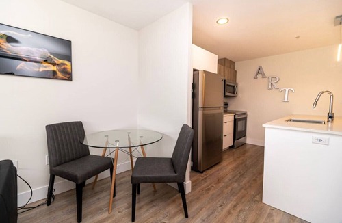 North End Apartment | Modern North End 1BD Suite w/Gym, On-Site Cinema & Workspace