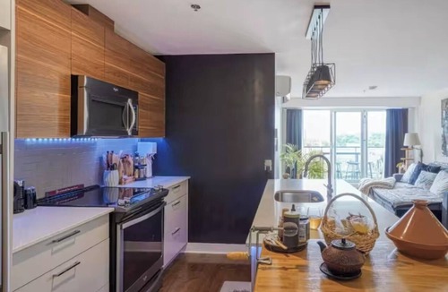Ahuntsic-Cartierville Apartment | Montreal Skyline Sanctuary – Chic & Cozy Living