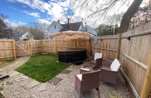 Laconia Apartment | NEW! Lovely unit w/PRIVATE Hot Tub and patio!