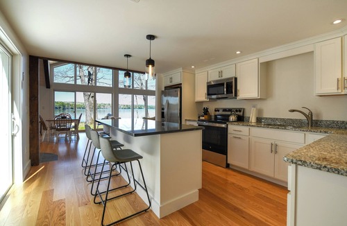 Harrison House | * NEWLY RENOVATED * Modern 4-bedroom home on Long Lake with sunset views!