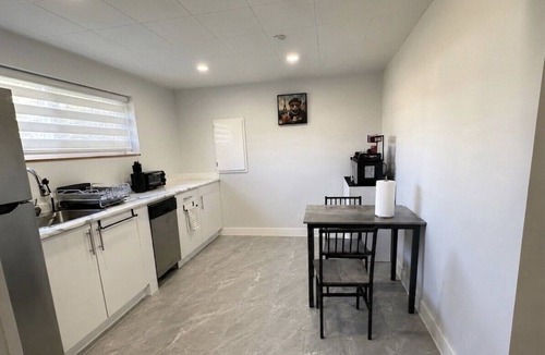 Killarney House | Newly renovated private basement Suite - central hub
