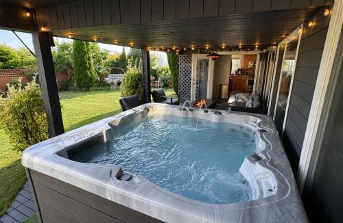 District of North Vancouver House | North Van Getaway with 3BR, Hot Tub and Huge Backyard