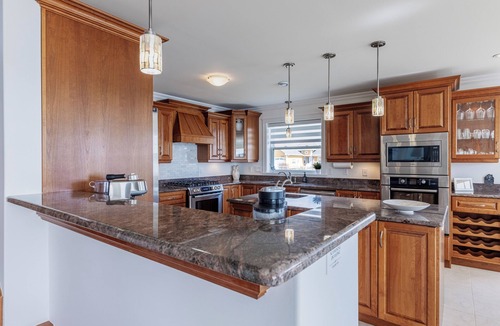 Bay Roberts House | Oceanfront, direct shoreline access, main floor master, and full ensuite.