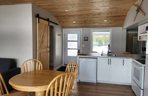 Adstock Ski Chalet | Ohana Chalet, on the Water's Edge with a Private Dock