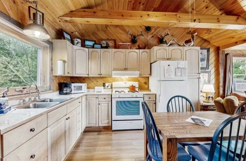 Greenville Cabin | Peaceful Waterfront Retreat with Deck, Kayaks & Fire Pit in Greenville, Maine
