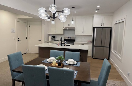 Keith House | Pearl of Calgary | Scenic Riverfront Walkout 2BR | Easy access to Banff