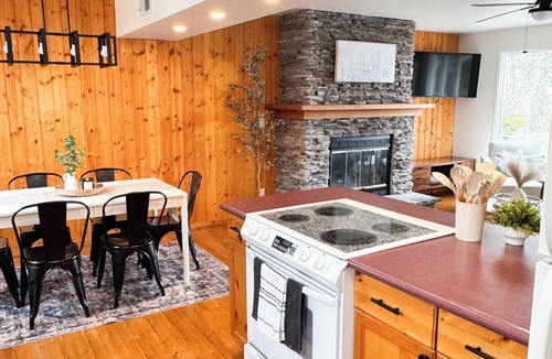 Westerose Cabin | Pine Haven: Cozy Lakefront Escape with Private Beach & Hot Tub