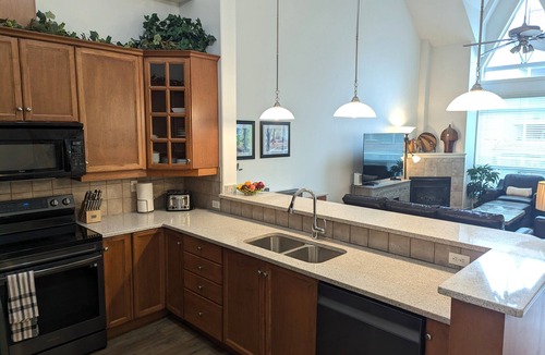 North End Condo | Pool Level Walkout condo- Balcony with the lagoon/Lake Views